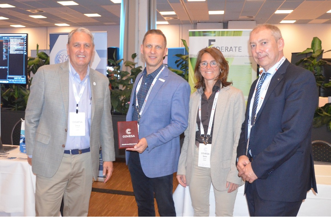 award 3 COVESA Executive Director Steve Crumb with the RemotiveLabs team